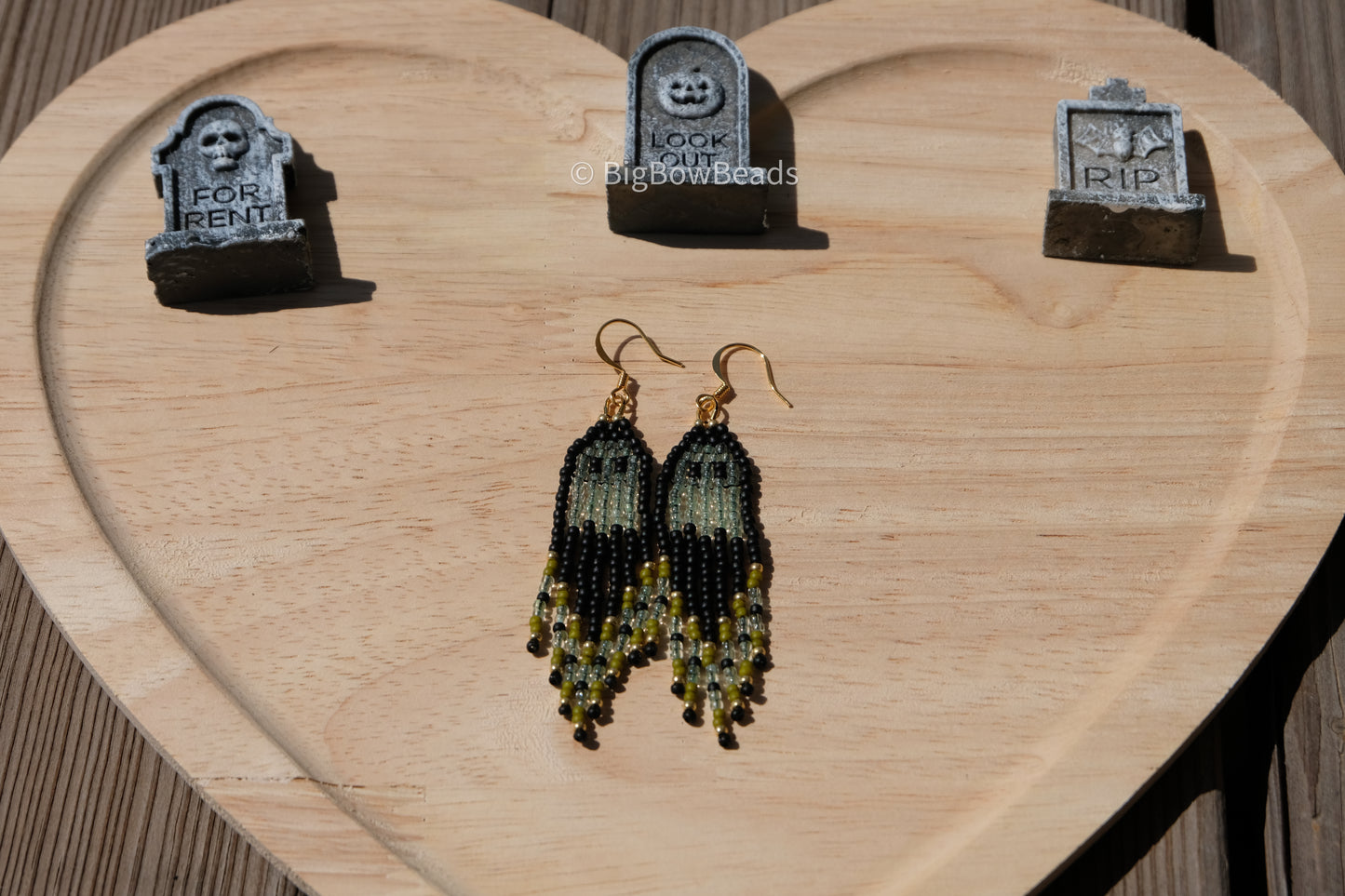 Green power puff ghost earrings