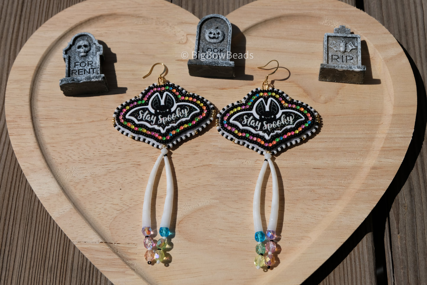 Bat with dentalium earrings