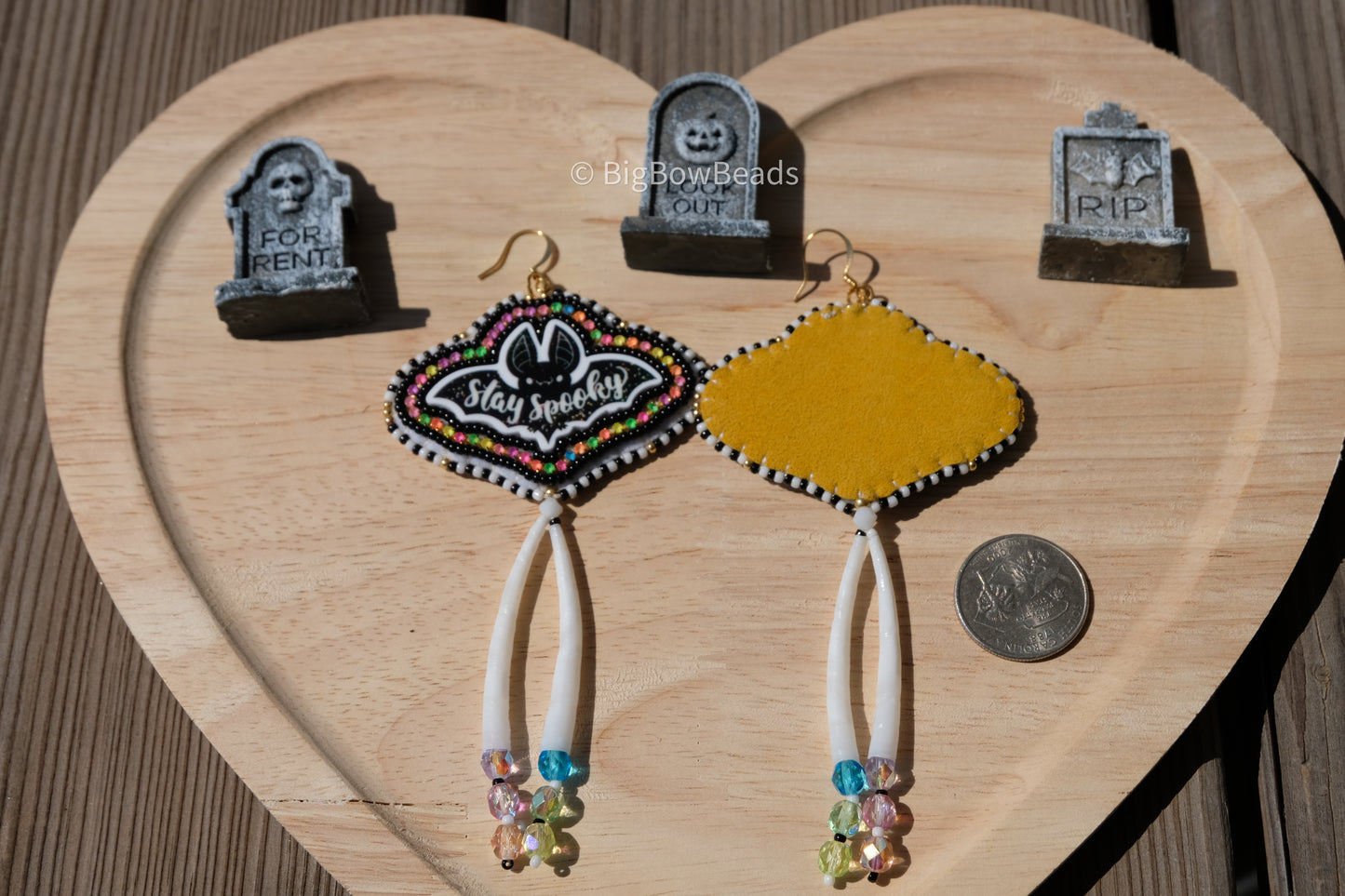 Bat with dentalium earrings