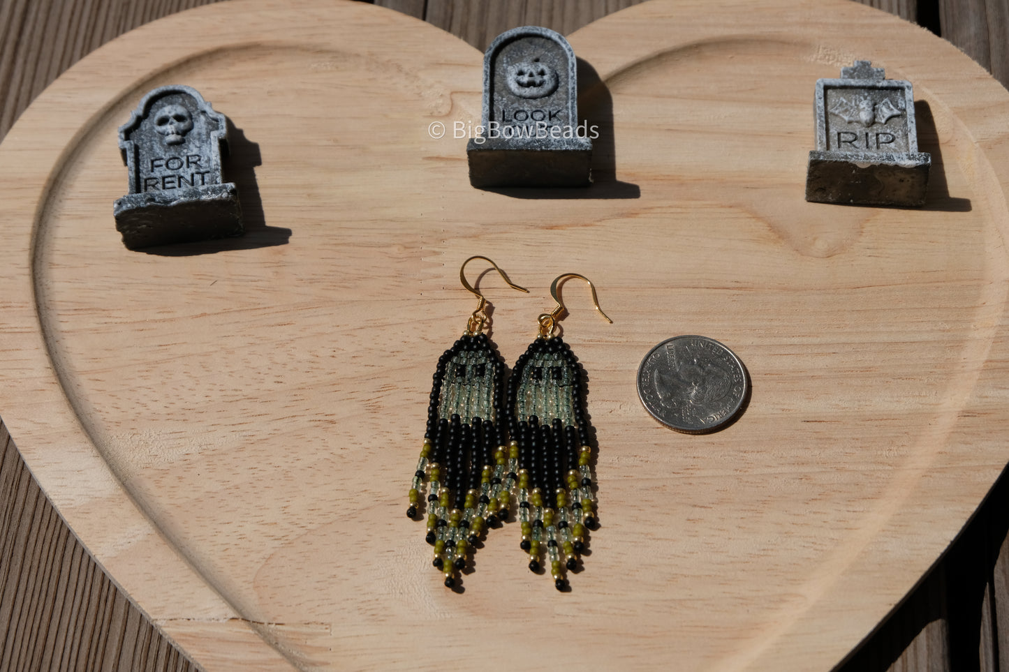Green power puff ghost earrings